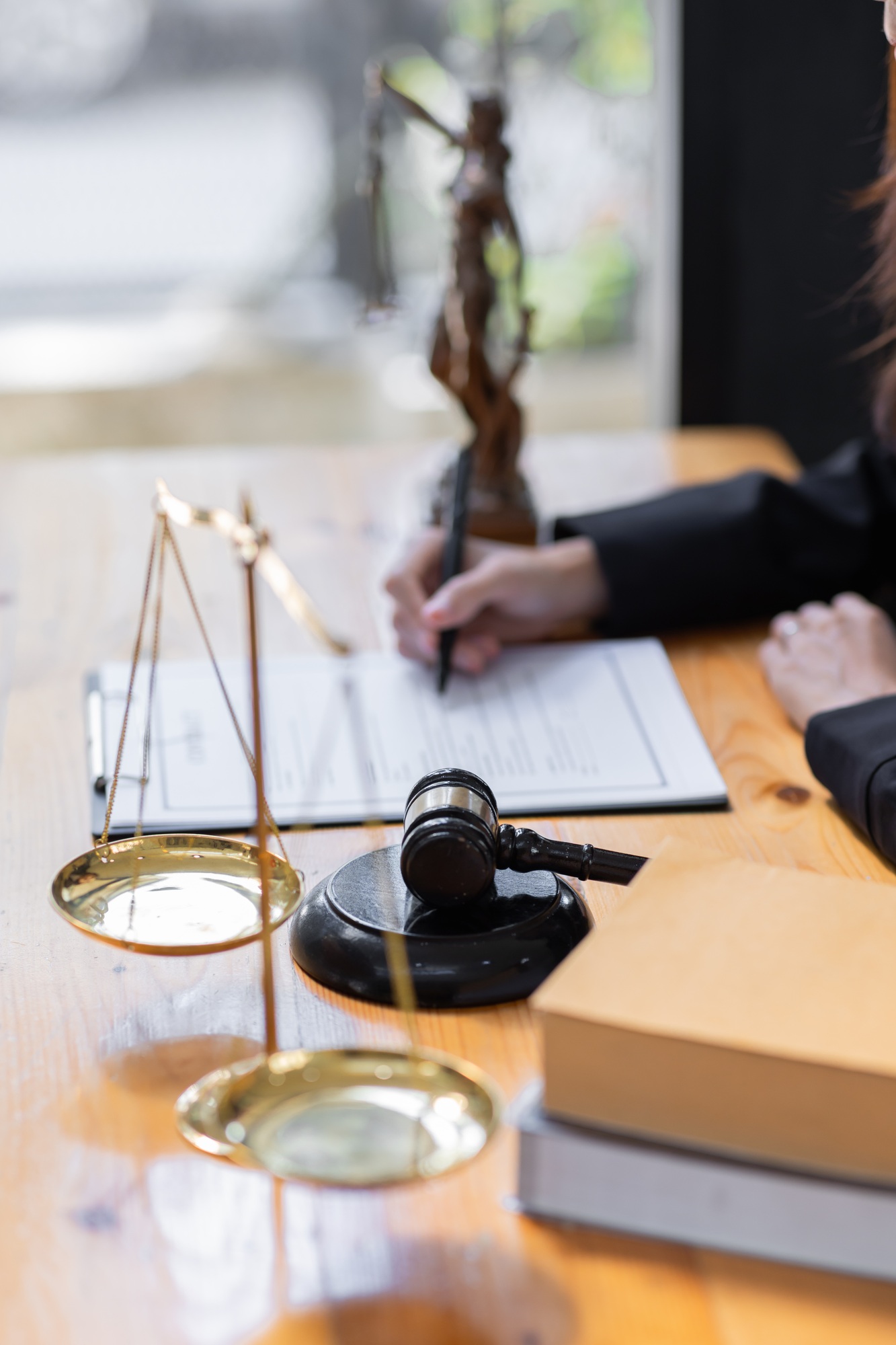 female business woman lawyers working at the law firms. Judge gavel with scales of justice. Legal